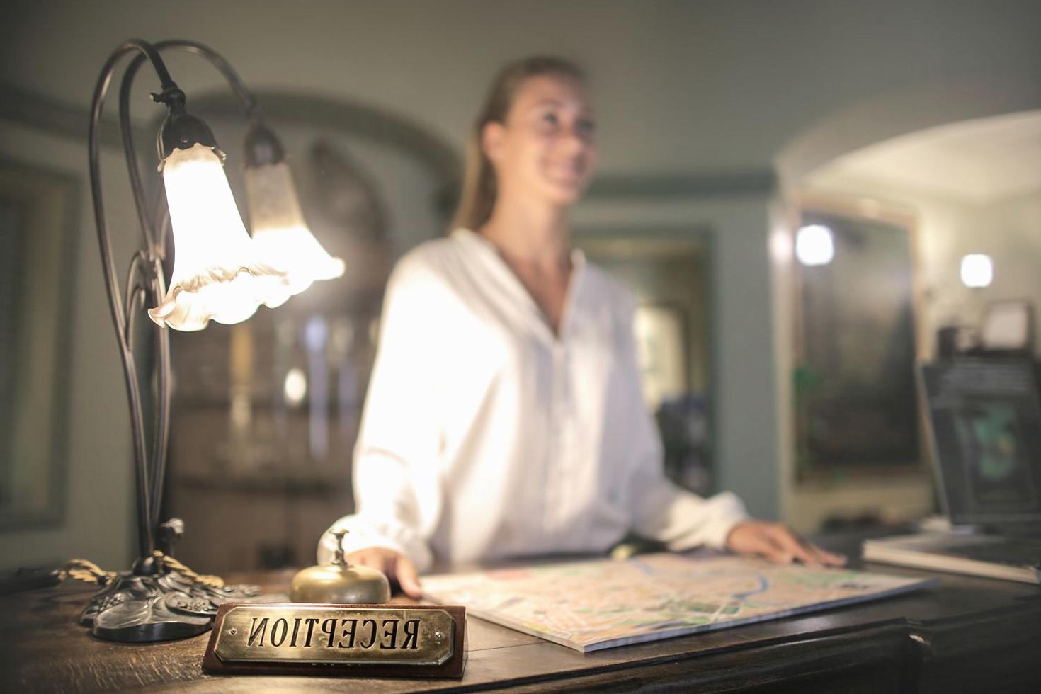Hotel concierge reviewing guest request