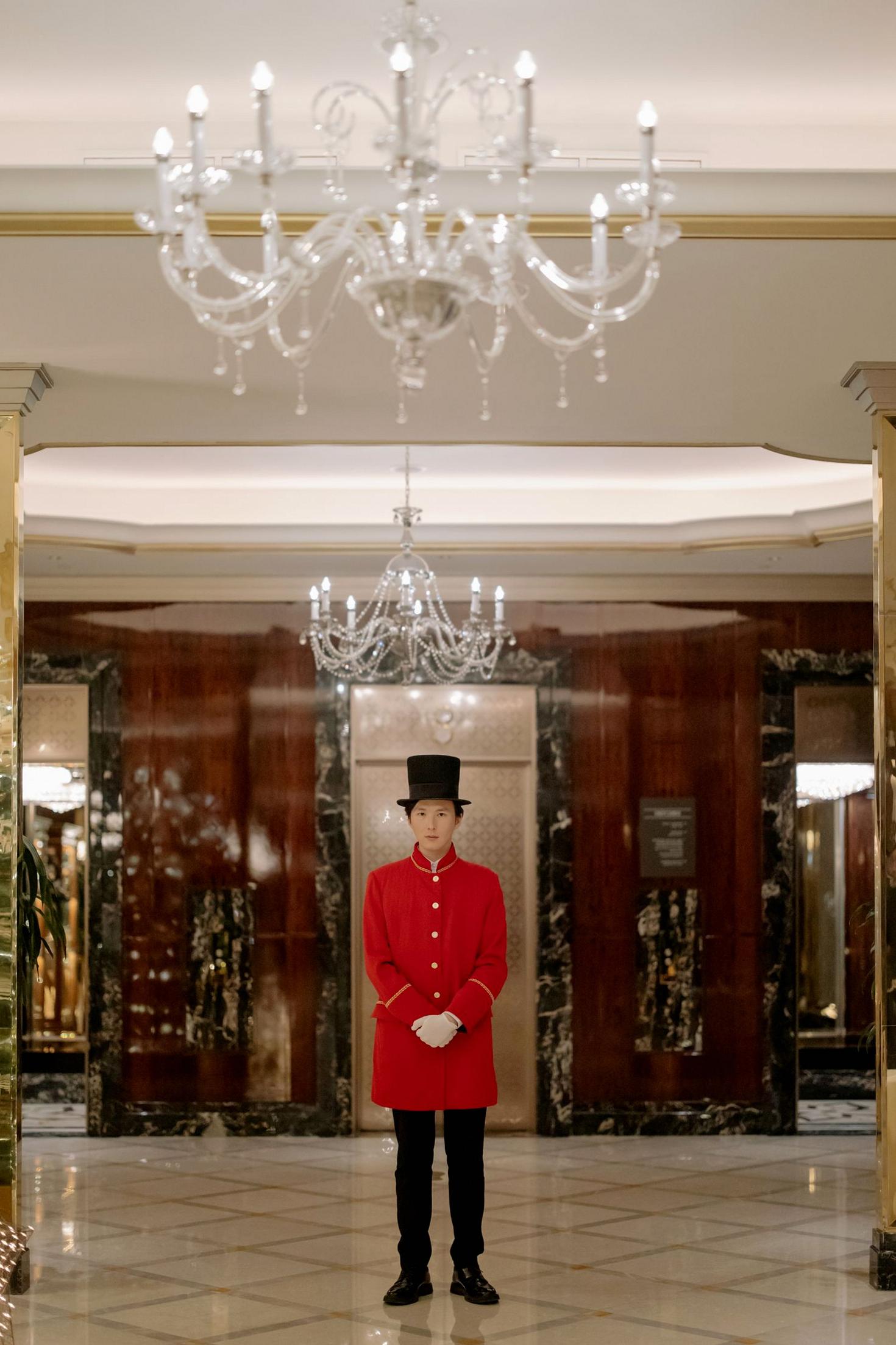 Concierge standing in luxury hotel lobby